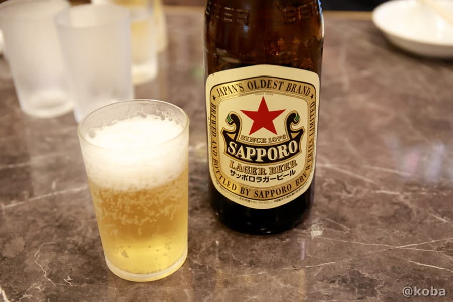 サッポロラガービール(赤星)の中瓶とグラス